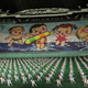 Illustration for article titled The Amazing, Colorful Flip Card Propaganda Mosaics of North Korea